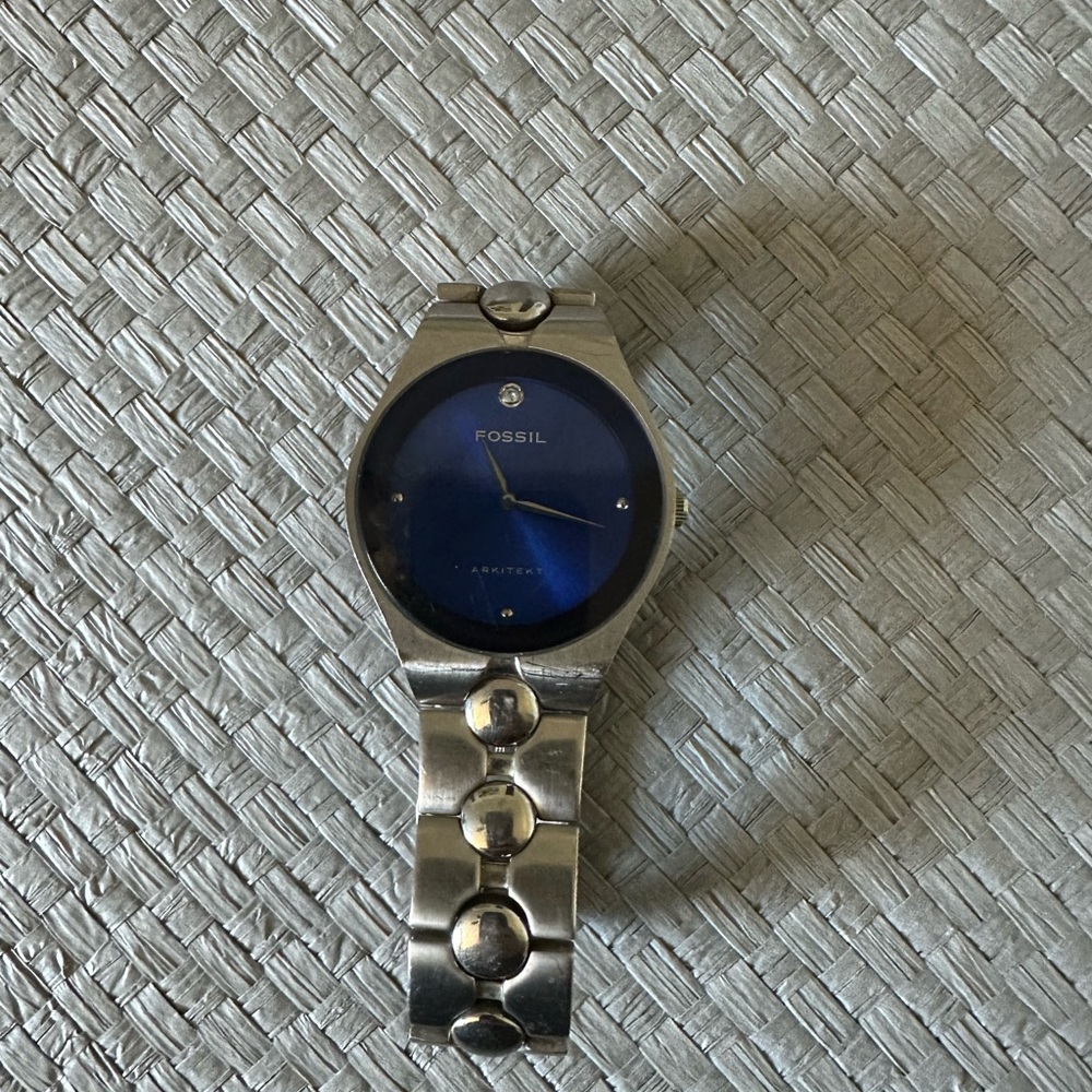 Fossil Blue and Silver Smartwatch with Elegant Design